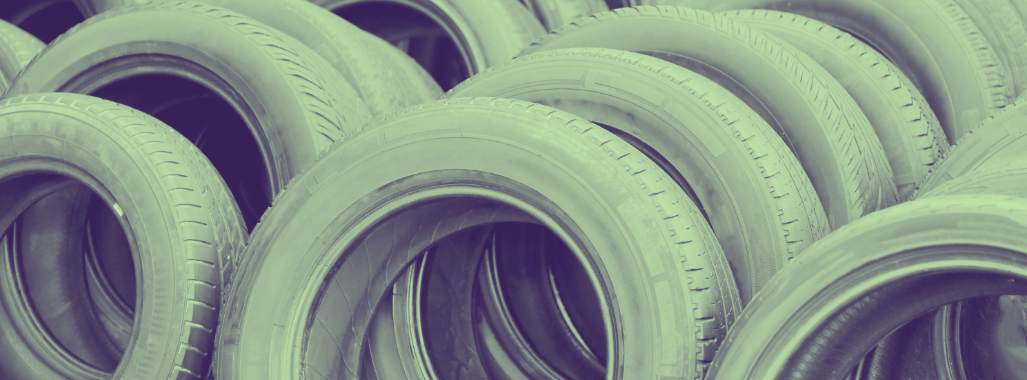 Rows of baled scrap tyres awaiting container loading for export